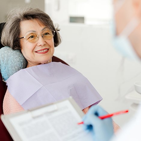 a dental implant patient during a consultation