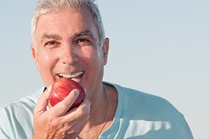 a patient biting into an apple