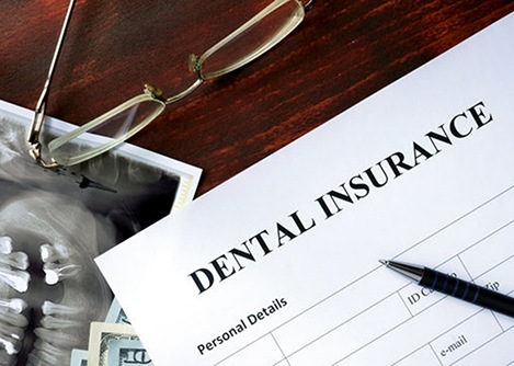 a closeup of a dental insurance form