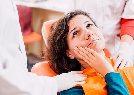 a patient dealing with dental pain