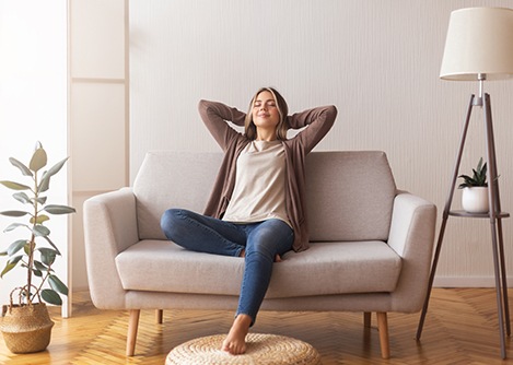 an oral surgery patient relaxing at home
