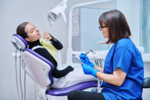 a patient smiling during a dental appointment
